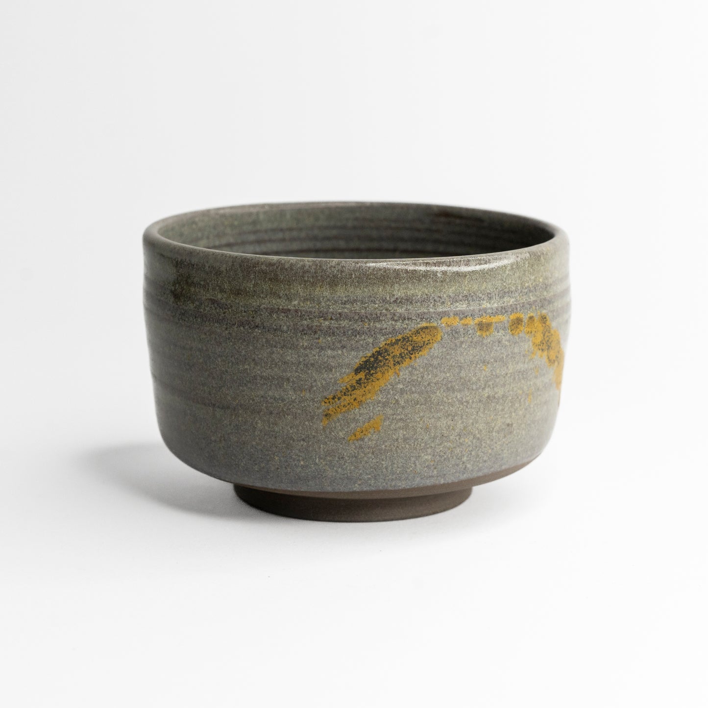 Grey chawan with golden detail