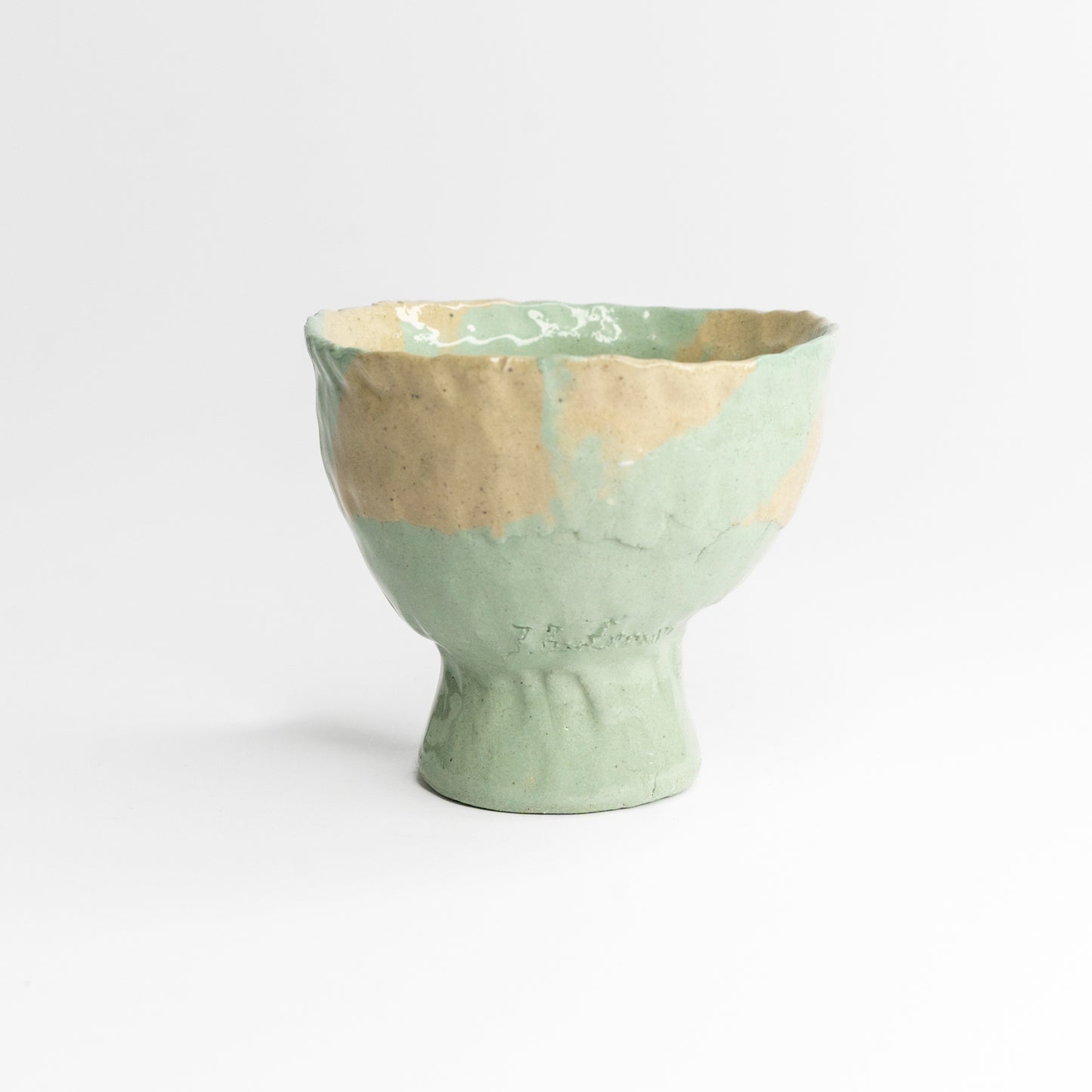 Blue and grey coloured clay cup