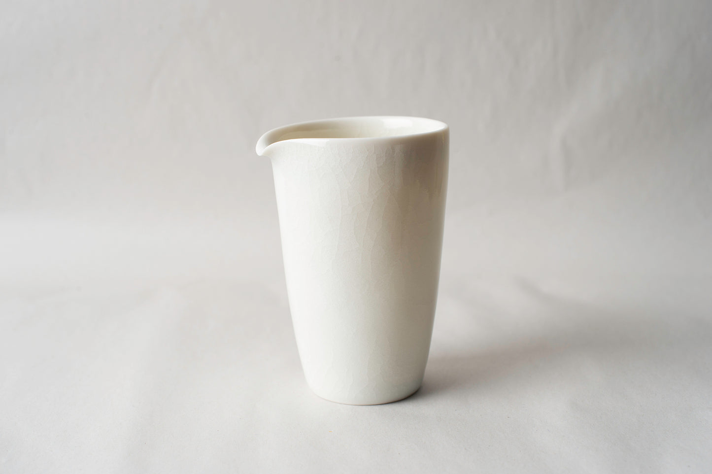 Porcelain sharing pitcher